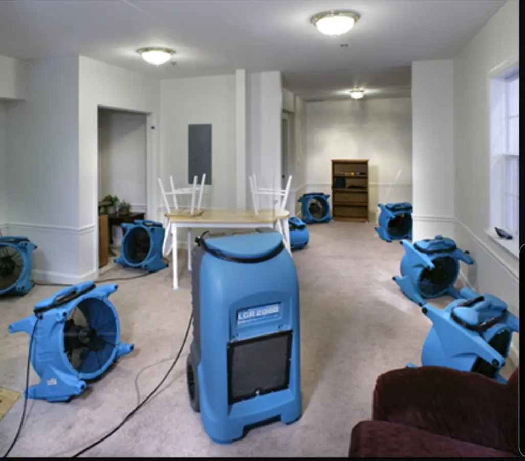 Air movers and dehumidifier setup for Water Extraction & Removal in Hondo